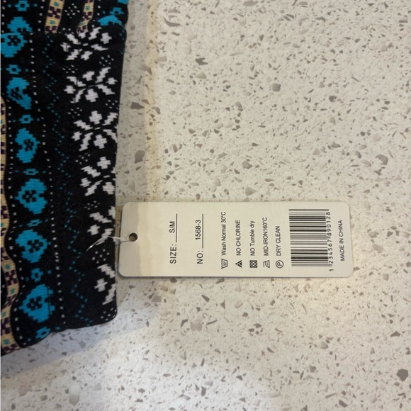 Qicaisi Patterned fleece lined Black and Blue Pants NWT - Picture 3 of 5